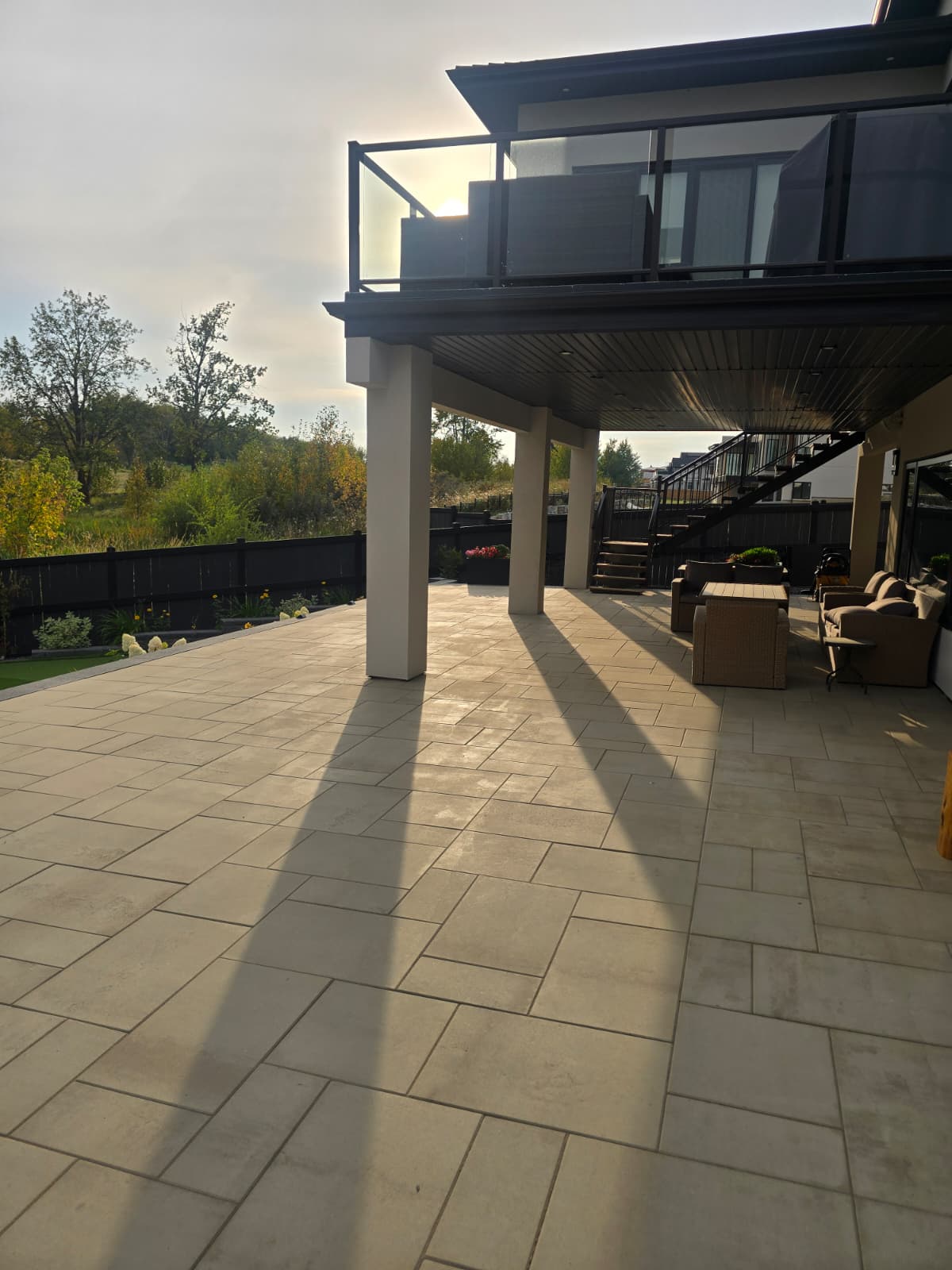Covered outdoor deck with tile flooring — Edmonton