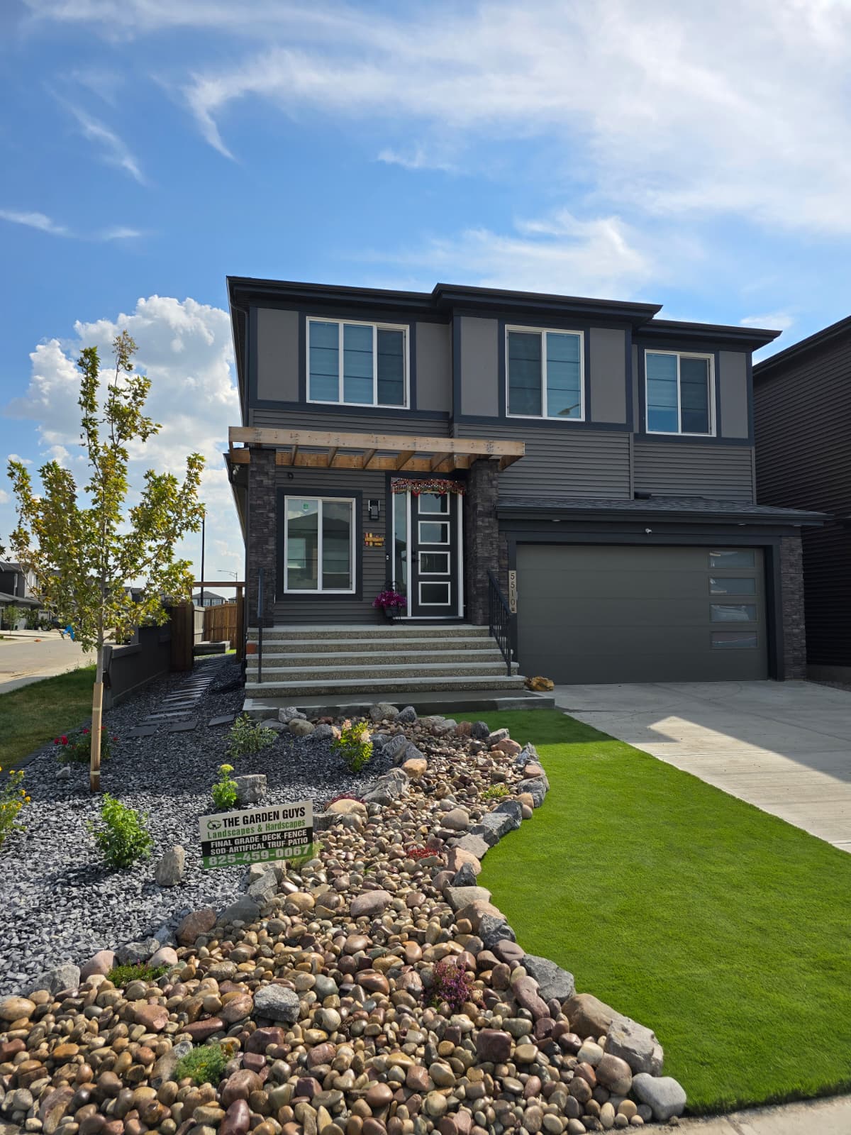 Garden Guys crew working on a hardscape project in Edmonton